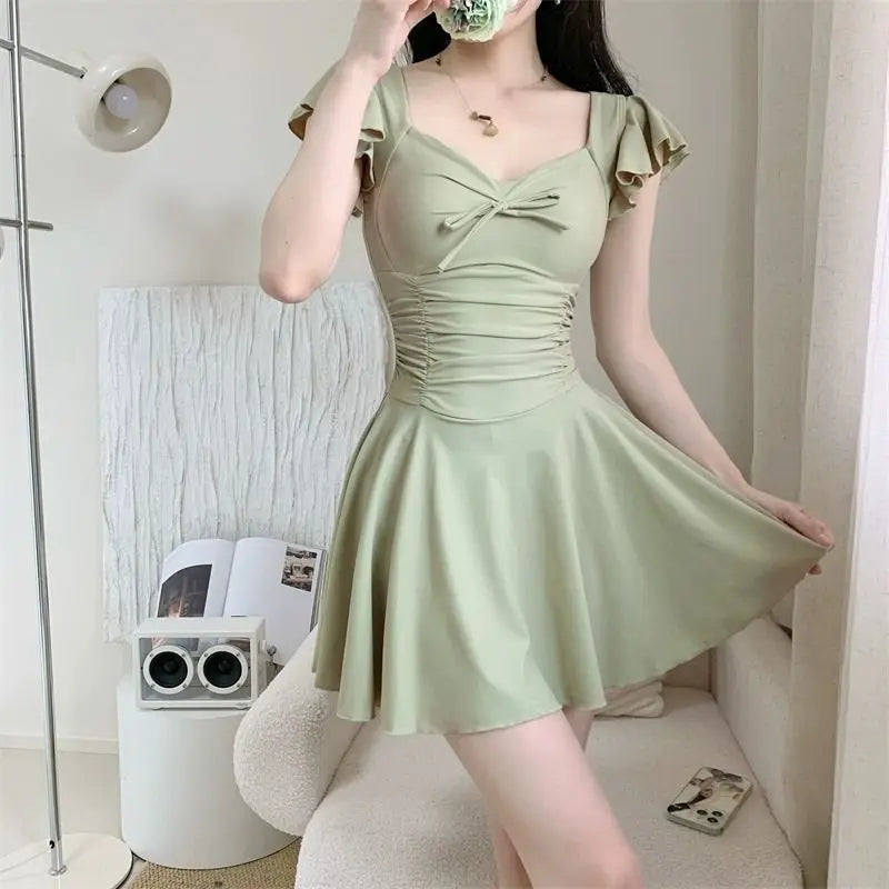 2026 New Women Skirted Swimdress Short Sleeve Tummy Control Swimsuit With Padding Slimming Hot Spring Bathing Suit